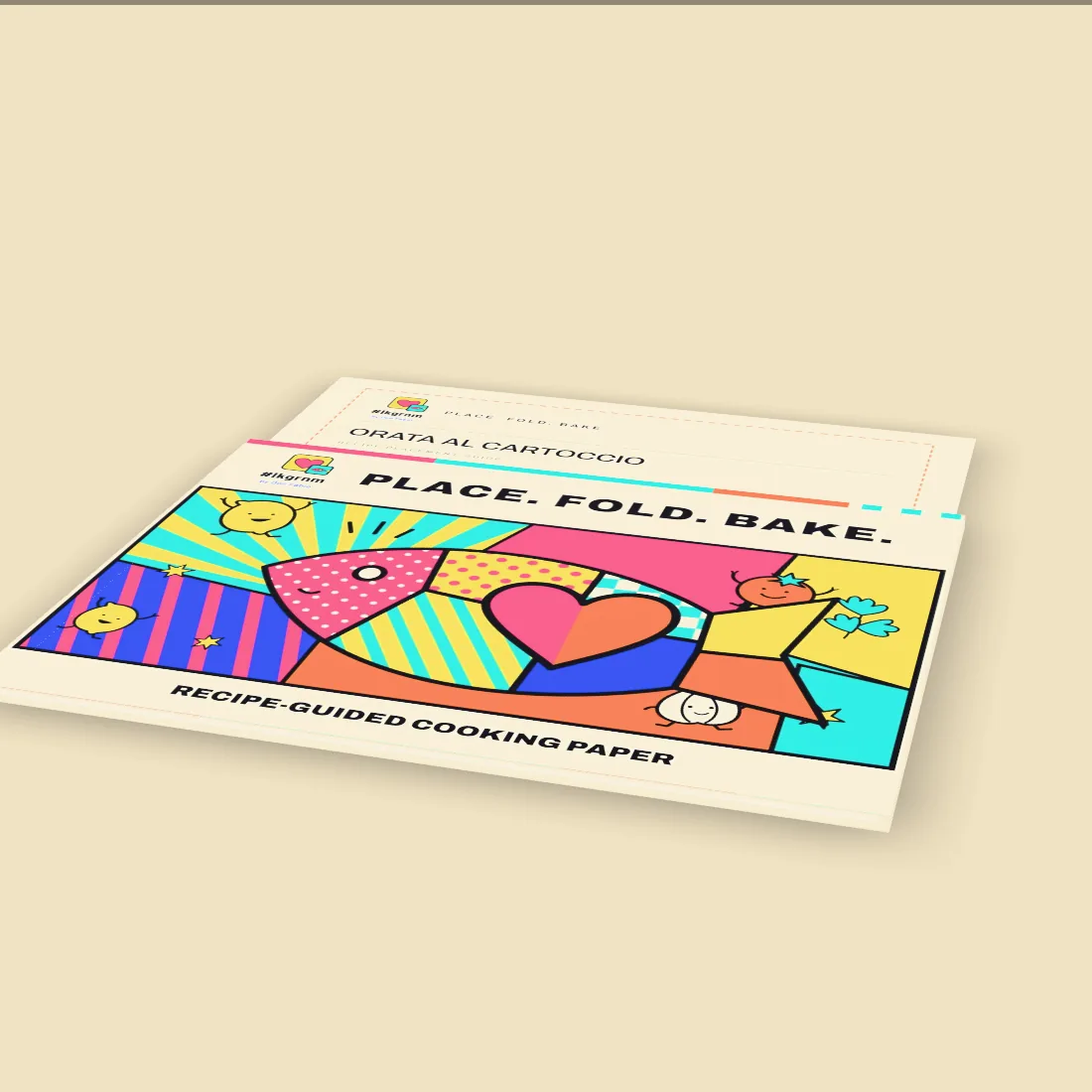 The LIKEGRANMA Flat Pack, a broad cream sleeve printed with the pop fish artwork, holding the recipe sheets
